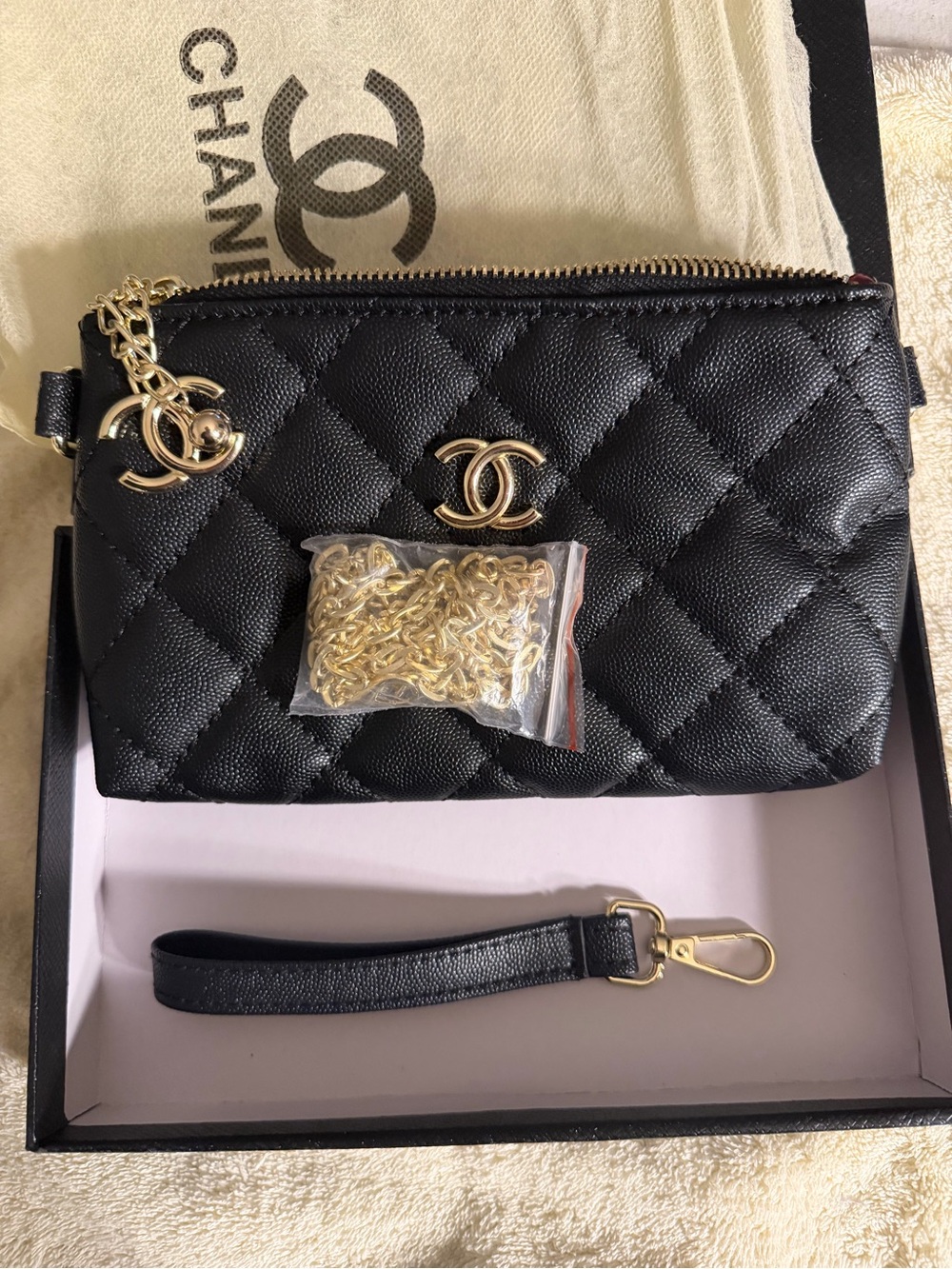 Chanel Black shoulder/wrist bag.